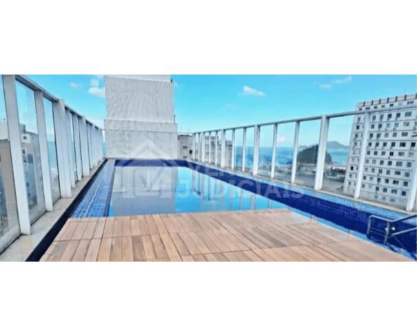 Foto de Leilao_Apto72_EdificioJoy_Santos